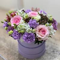 Цветы в шляпных коробках